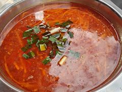 -黄利砖万峰林布依特色酸笋牛肉馆