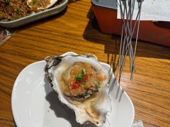 蒜蓉烤生蚝-金太阳海鲜烧烤·本地人餐厅(星海公园店)