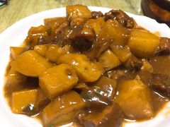 土豆烧牛腩-华春餐馆(鱼山路店)