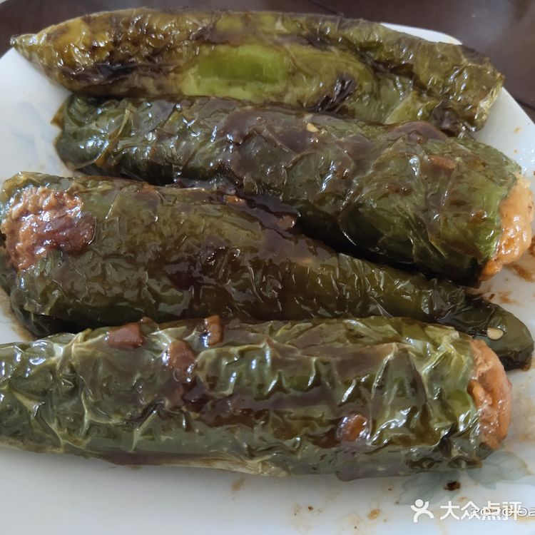 炸的时候也先炸开口来封上，之后就小火慢炸，真的很慢啊
