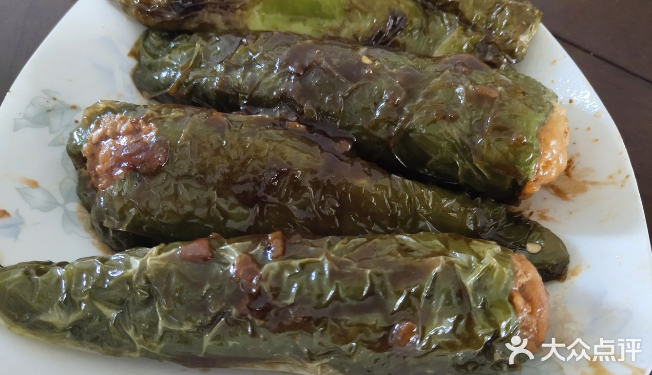 炸的时候也先炸开口来封上，之后就小火慢炸，真的很慢啊