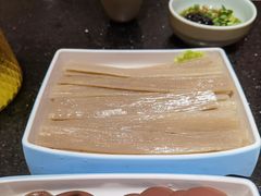 -明何记涮牛肚(品牌首店隋唐植物园南门古城路店)