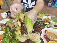 -沐毫傣泐云南菜孔雀宴•手抓饭傣味烧烤(曼听公园店)