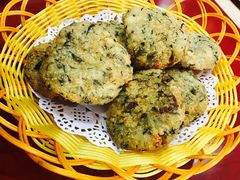 艾蒿饼-万佛湖许老大铁锅鱼(黑金冠店)