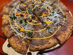 新疆披萨馕-艾丁湖烤全羊西域文化主题餐厅(新天润店)