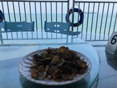 姜葱炒花甲-七鲜渔港美食餐厅(巽寮湾海景店)