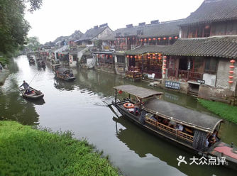 几年前去的西塘，西塘还是挺小家碧玉的