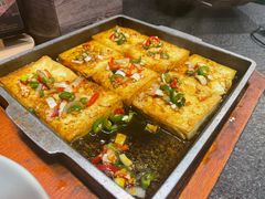 石板煎豆腐-草家酱蟹炭火烤肉店(珲春南路一店)