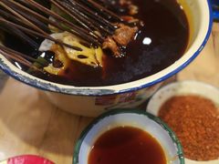 -拈签一笑黄牛肉辣卤串串