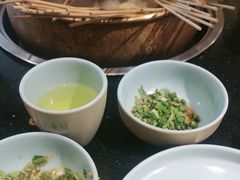 -明何记涮牛肚(品牌首店隋唐植物园南门古城路店)