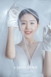 -雪中彩影婚纱摄影·微光艺术中心