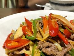 酸木瓜炒牛肉-紫滇源云南生态菜(丹凤街店)
