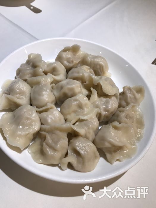 金春禧(世茂国际广场店)酸菜肉丁水饺图片 - 第1张