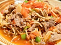 酸笋丝炒牛肉片-金孔雀德宏傣味餐馆(魏公村店)