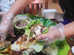 -沐毫傣泐云南菜孔雀宴•手抓饭傣味烧烤(曼听公园店)