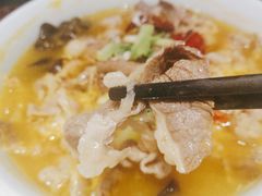 酸汤煮极品肥牛-柒园·三十年创意杭帮菜(龙湖滨江天街店)