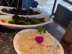 -老牌坊云南鱼豆花火锅(哈西万达店)