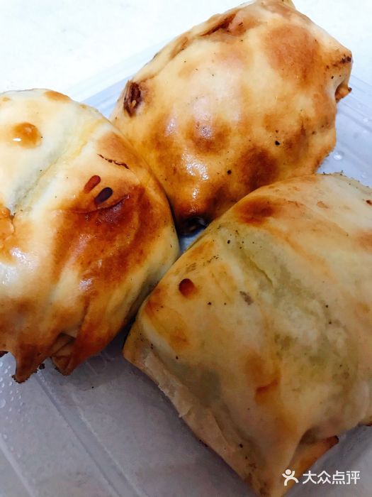 新疆巴州金丝特餐厅(大钟寺店)烤包子图片