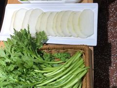 -明何记涮牛肚(品牌首店隋唐植物园南门古城路店)