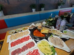 -明何记涮牛肚(品牌首店隋唐植物园南门古城路店)