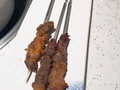 烤羊肉串-三人行骨头王火锅(长寿店)