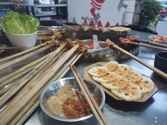 -彝人部落火盆烧烤(原内环足球场店)