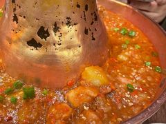 土司铜锅油焖鸡-浩海火烧云傣家菜(京广店)