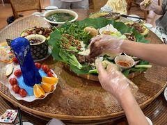 -沐毫傣泐云南菜孔雀宴•手抓饭傣味烧烤(曼听公园店)