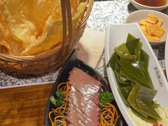 -老牌坊云南鱼豆花火锅(哈西万达店)