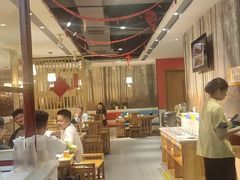 -明何记涮牛肚(品牌首店隋唐植物园南门古城路店)