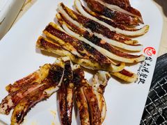 烤鱿鱼-金太阳海鲜烧烤·本地人餐厅(星海公园店)