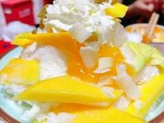 芒果雪冰-喜悦小串丹东小黄牛海鲜烧烤大排档(民主广场店)