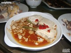 蒸臭豆腐有那个咸菜杆,所以味道很浓郁-林家饭店(新林公路店)