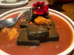 猴头菇鲍汁瑶柱扒制黑豆腐-肴约·花园式餐厅(湖里店)