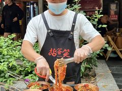 -拈签一笑黄牛肉辣卤串串