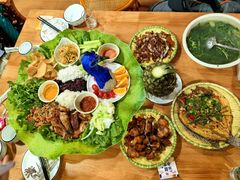 -沐毫傣泐云南菜孔雀宴•手抓饭傣味烧烤(曼听公园店)