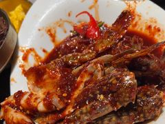 草家招牌酱辣蟹-草家酱蟹炭火烤肉店(珲春南路一店)