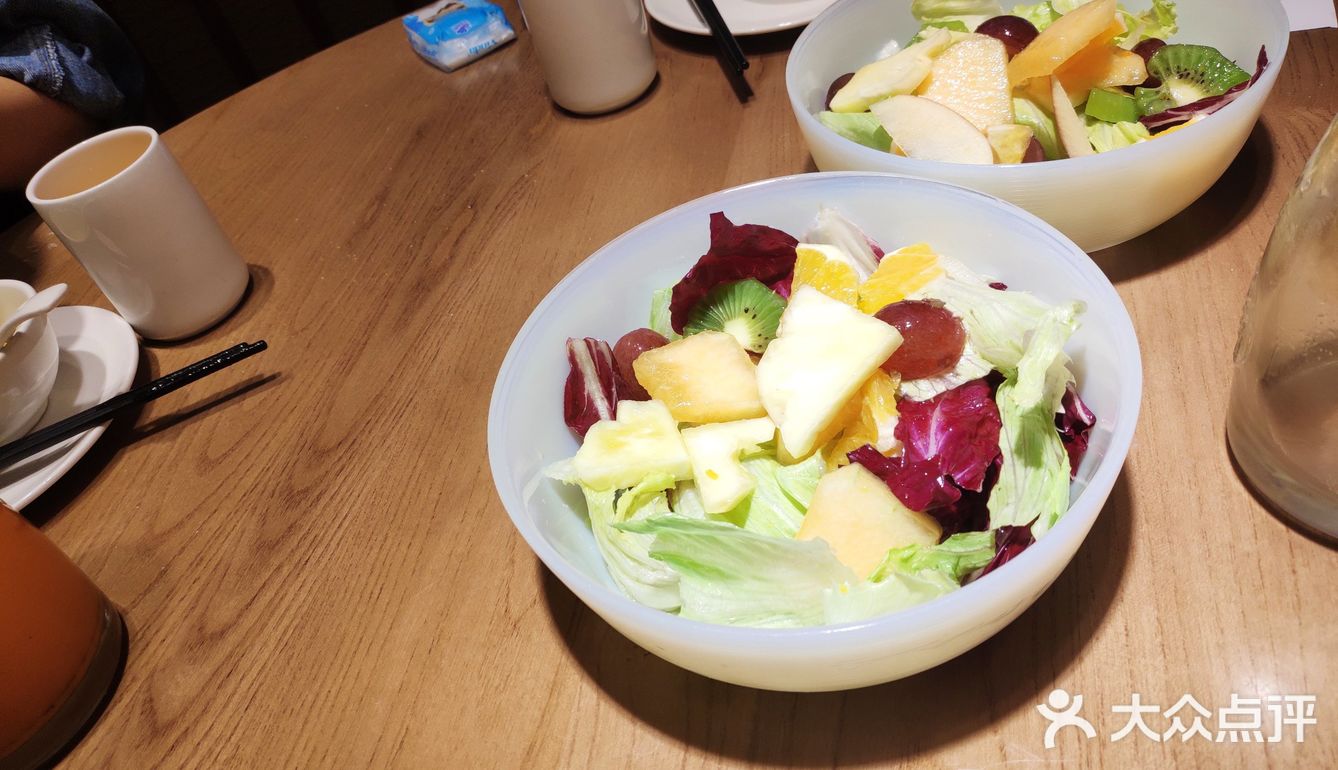 非常好找，门口的大小鼓可以去敲敲