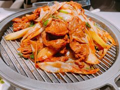 经典葱爆小羔羊肉-悦融·京鲁菜·露台花园(安定门店)