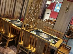 -明何记涮牛肚(品牌首店隋唐植物园南门古城路店)