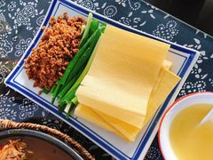 勾魂小媳妇-八两八金·莱芜特色炒鸡(市南漳浦路店)