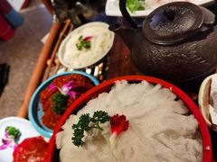 -老牌坊云南鱼豆花火锅(哈西万达店)