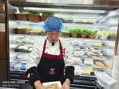 -明何记涮牛肚(品牌首店隋唐植物园南门古城路店)