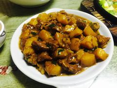 土豆烧牛腩-华春餐馆(鱼山路店)