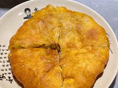 牛肉烤饼-肖四女乐山跷脚牛肉(江北星街坊店)