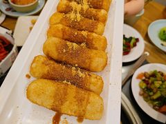 -明何记涮牛肚(品牌首店隋唐植物园南门古城路店)