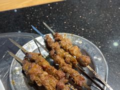 -明何记涮牛肚(品牌首店隋唐植物园南门古城路店)