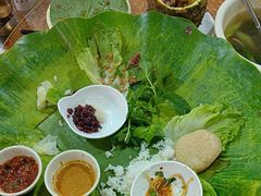 -沐毫傣泐云南菜孔雀宴•手抓饭傣味烧烤(曼听公园店)