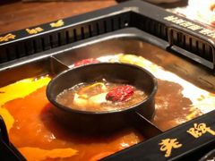 番茄麻辣锅-老牌坊云南鱼豆花火锅(哈西万达店)