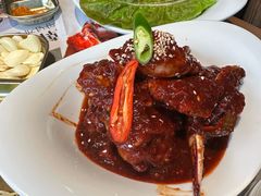 草家招牌酱辣蟹-草家酱蟹炭火烤肉店(珲春南路一店)